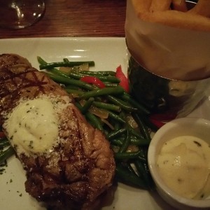 Grilled Strip Steak with Garlic-Herb Butter and Pommes Frites